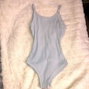LIGHT GRAY BODY SUIT DRAMATIC “U” CUT BACK